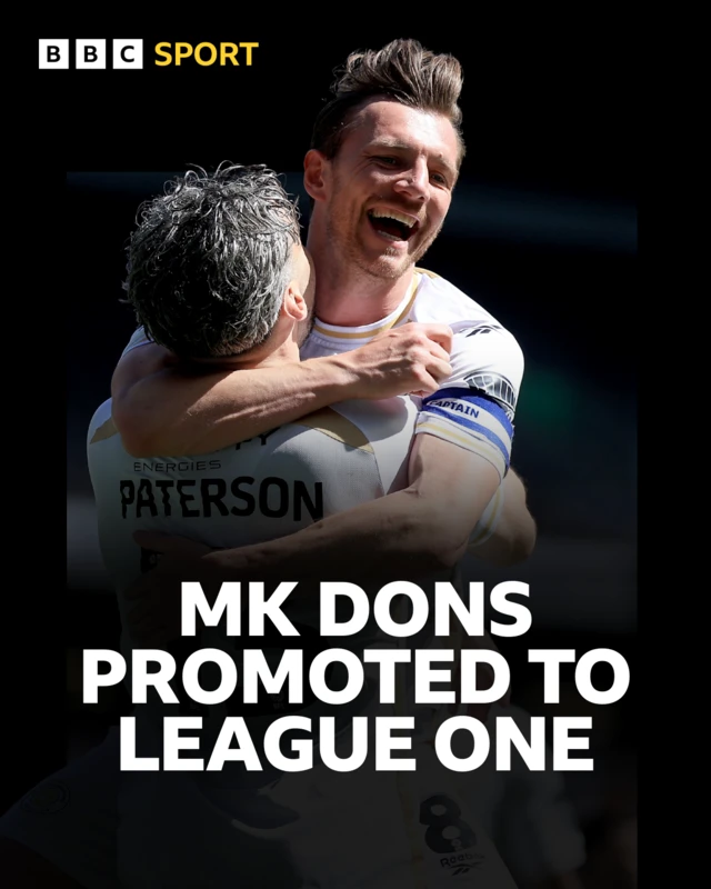 An image of MK Dons celebrating above the words 'MK Dons promoted to League One'