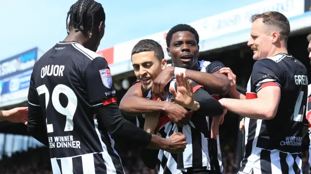 Jaze Kabia of Grimsby Town celebrates scoring