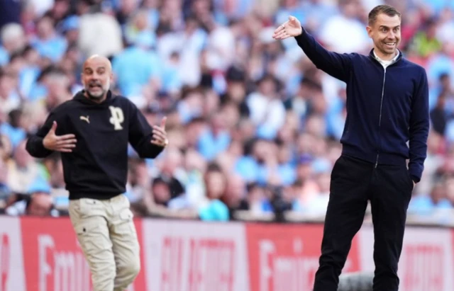 Southampton manager Tonda Eckert (right) reacts on the touchline as Manchester City manager Pep Guardiola watches on
