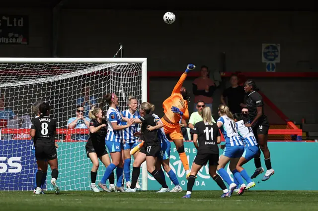 Chiamaka Nnadozie punches the ball