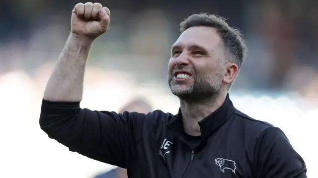 Derby boss John Eustace punchting the air