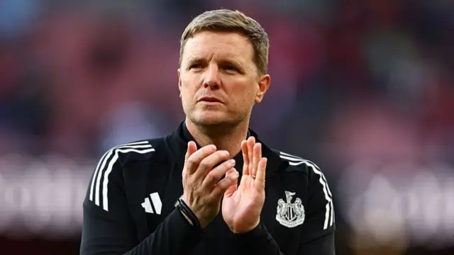Eddie Howe applauds Newcastle fans at Arsenal