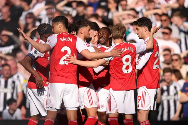 Eberechi Eze of Arsenal celebrates with teammates after scoring a goal