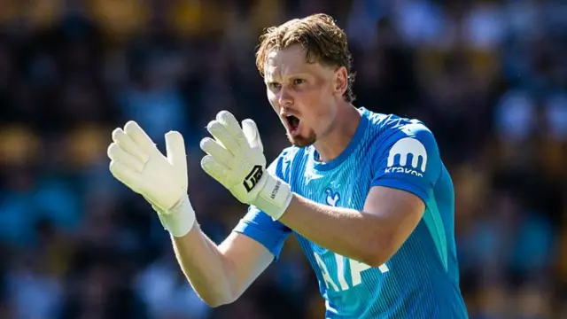 Antoni Kinsky claps his gloves during Tottenham's win over Wolves