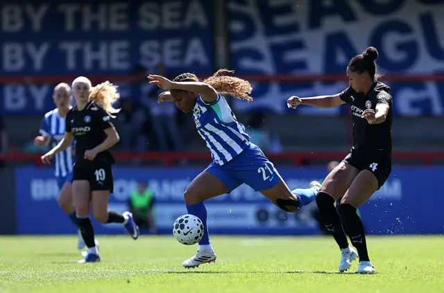 Madison Haley runs with the ball