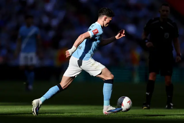 Phil Foden of Manchester City runs with the ball