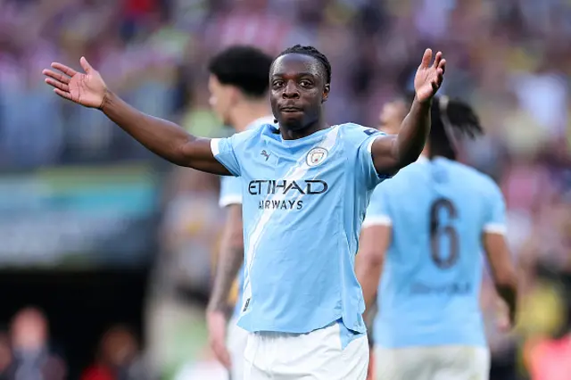 Jeremy Doku of Manchester City celebrates