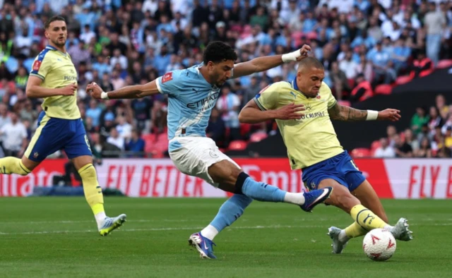 Manchester City's Omar Marmoush shoots at goal