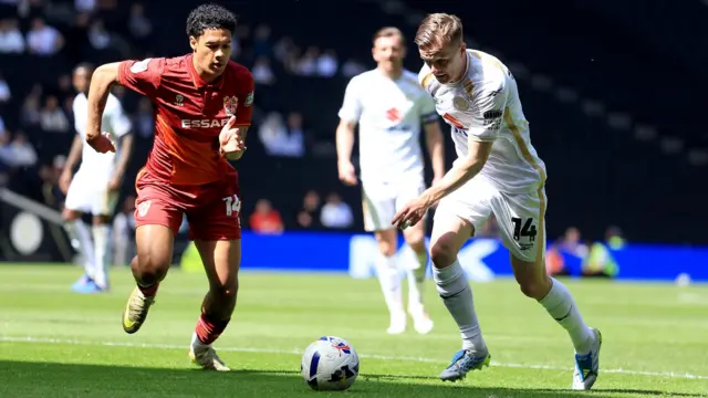 Joe Tomlinson of Milton Keynes Dons in action
