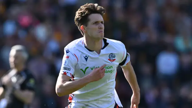 Johnny Kenny of Bolton Wanderers celebrates scoring the opening goal