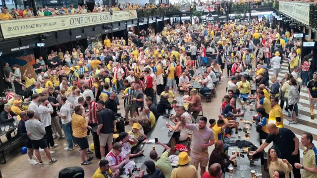 Saints fans at food stalls at Wembley