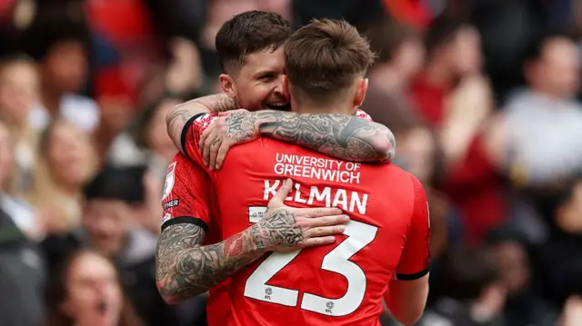 Lyndon Dykes and Charlie Kelman celebrate for Charlton