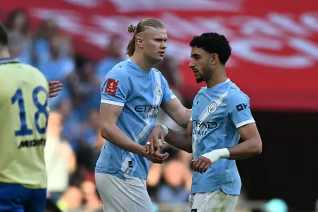 Erling Haaland (C) comes on for Manchester City's Egyptian striker Omar Marmoush