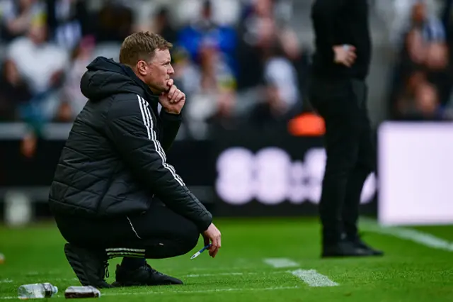 Newcastle United Head Coach Eddie Howe looks on