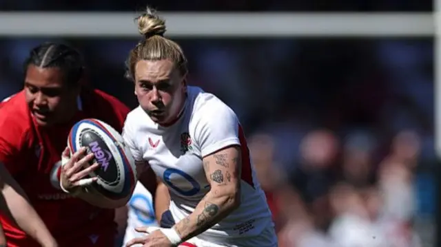 Meg Jones in white England kit