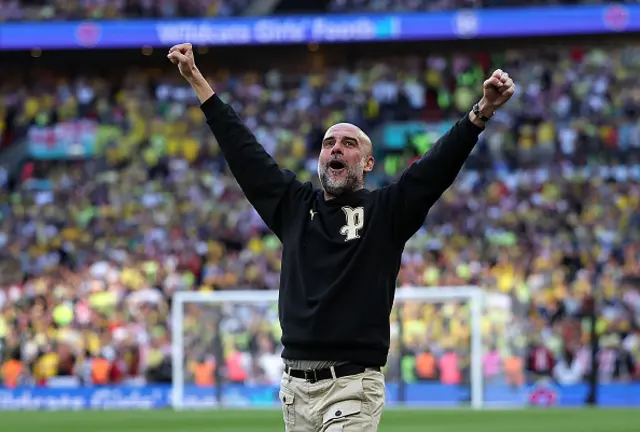Pep Guardiola celebrates