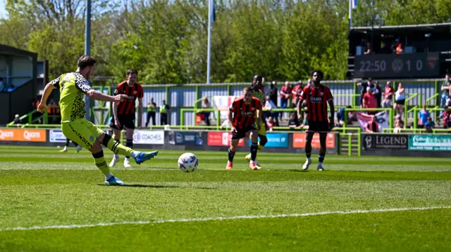Kyle McAllister scores a penalty for Forest Green