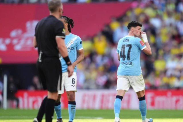 Manchester City's Phil Foden walks off the field