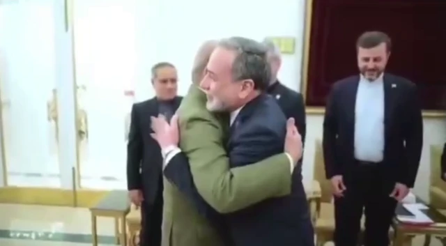 Iranian Foreign Minister Abbas Araghchi hugs Pakistani Prime Minister Shehbaz Sharif in Islamabad