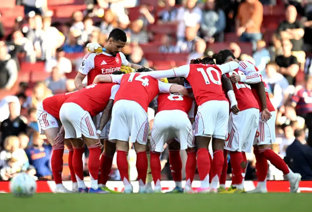 Arsenal team huddle