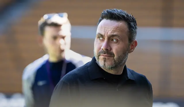 Tottenham Hotspur's manager Roberto De Zerbi looks on