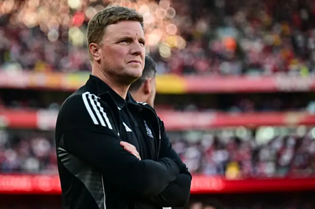 Coach Eddie Howe looks on