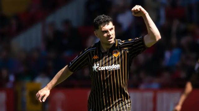 John Egan celebrates equalising for Hull at Charlton