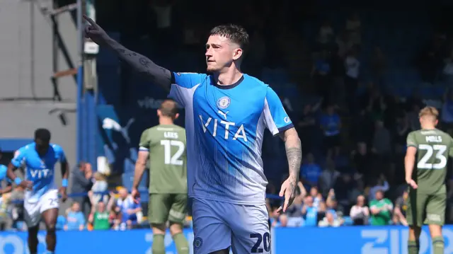 Louie Barry of Stockport County celebrates scoring