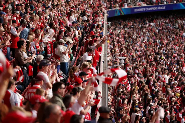 Fans of Arsenal celebrate the teams victory