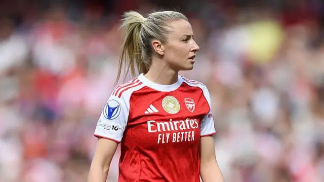Leah Williamson of Arsenal looks on