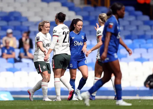 Erin Cuthbert of Chelsea celebrates scoring her team's fourth goal with teammate Lucy Bronze