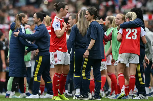 Renee Slegers congratulates players at the end
