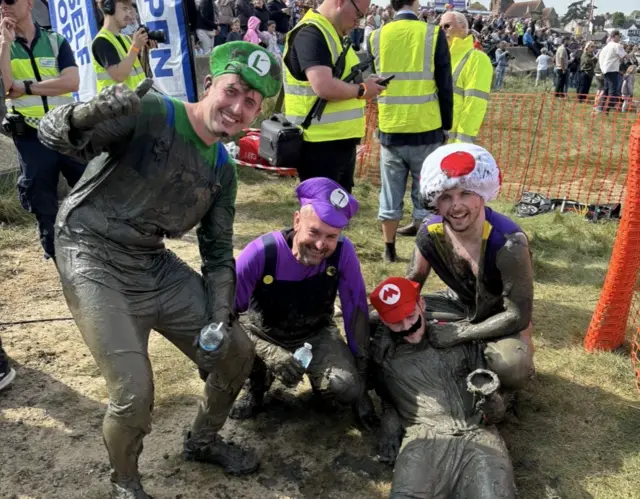 Men dressed as super Mario characters