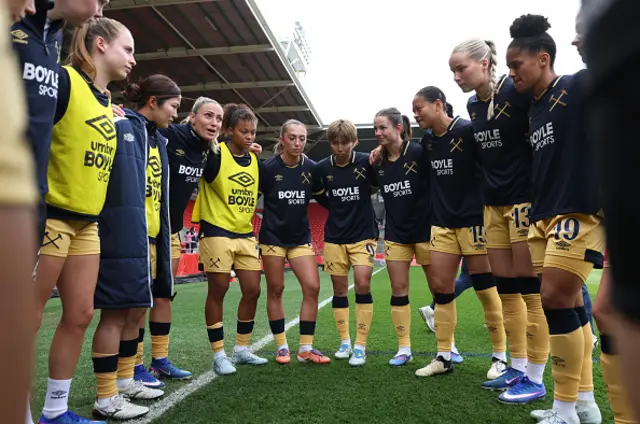Players of West Ham United huddle