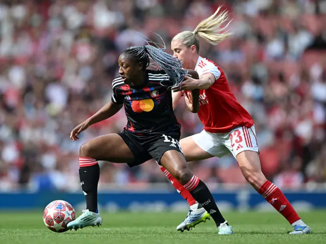 Kadidiatou Diani of OL Lyonnes is challenged by Alessia Russo of Arsenal