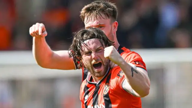 Will Ferry celebrates his second goal for Dundee United
