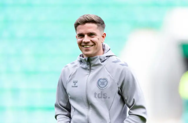 Hearts midfielder Cammy Devlin misses out