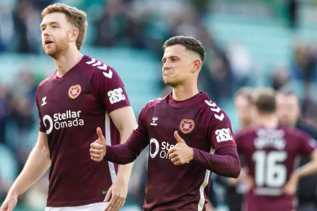 Sabah Kerjota (right) celebrates with Stuart Findlay