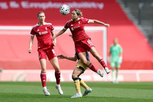 Fuka Nagano of Liverpool challenges for a header