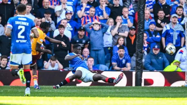 Emmanuel Longelo scores for Motherwell against Rangers