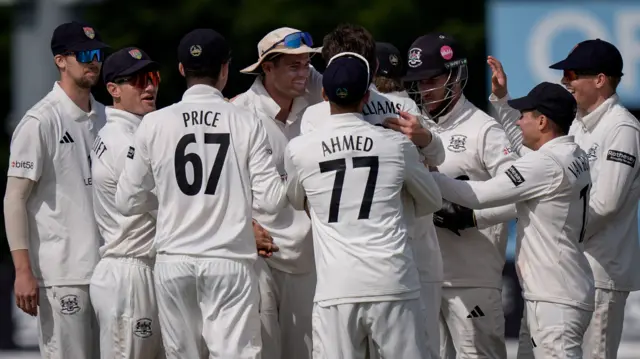 Gloucestershire celebrate taking wicket