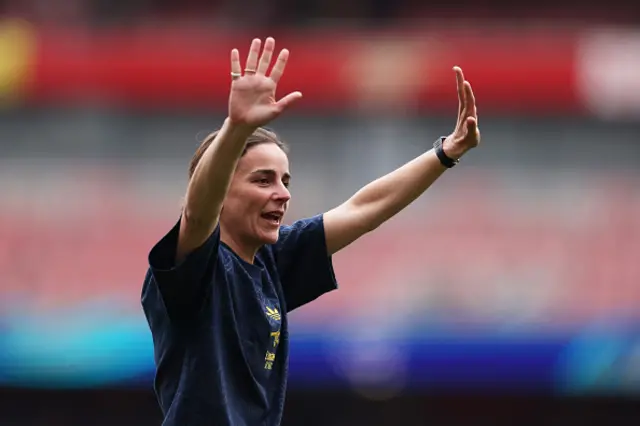 Renee Slegers, Manager of Arsenal, acknowledges the fans