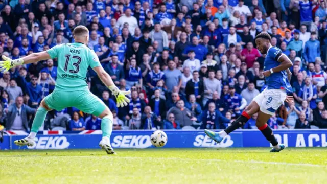 Youssef Chermiti scores for Rangers against Motherwell