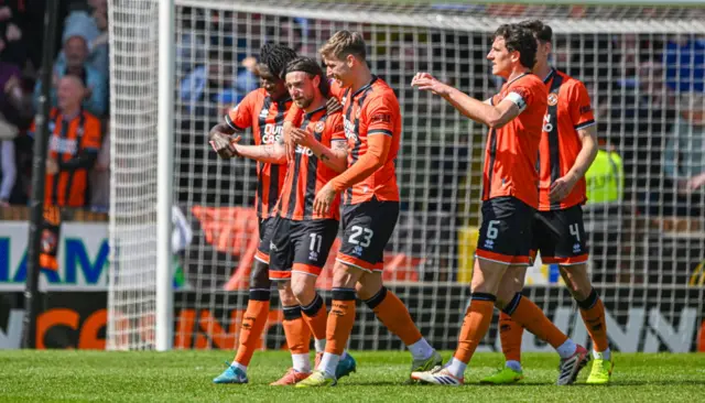 Dundee United celebrate Will Ferry's opener at Tannadice