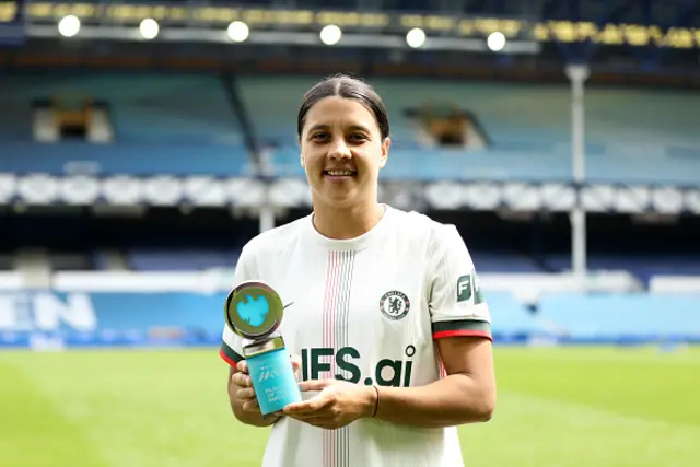 Sam Kerr of Chelsea poses for a photo with the Barclays Player of the Match award