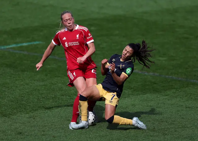 Alice Bergstrom of Liverpool is challenged by Ines Belloumou of West Ham United