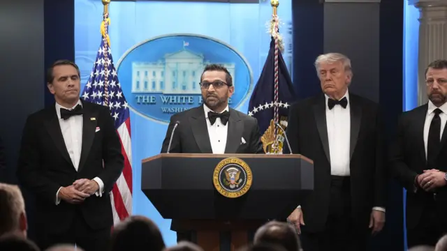 FBI Director Kash Patel stands at podium during Washington press conference last night following shooting