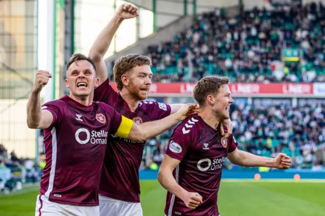 Hearts players celebrate at Easter Road