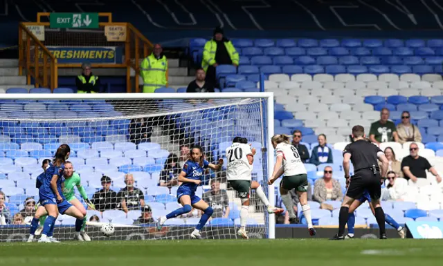 Erin Cuthbert of Chelsea scores her team's fourth goal