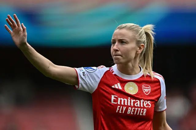 Leah Williamson waves to fans at the end